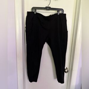 Carhartt Charcoal Apparel with Iconic Yellow Emblem